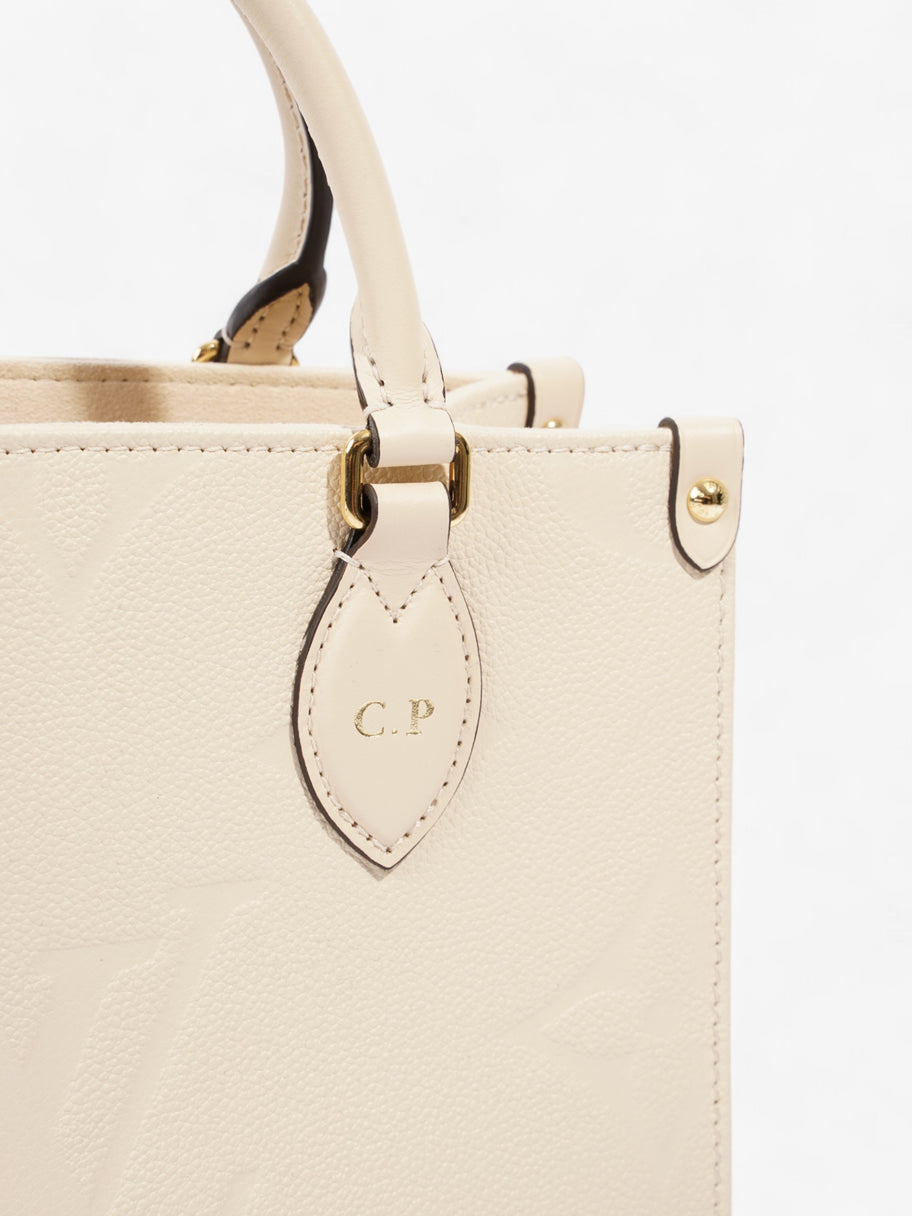 Louis Vuitton On the Go Creme Empreinte Leather PM Image 9